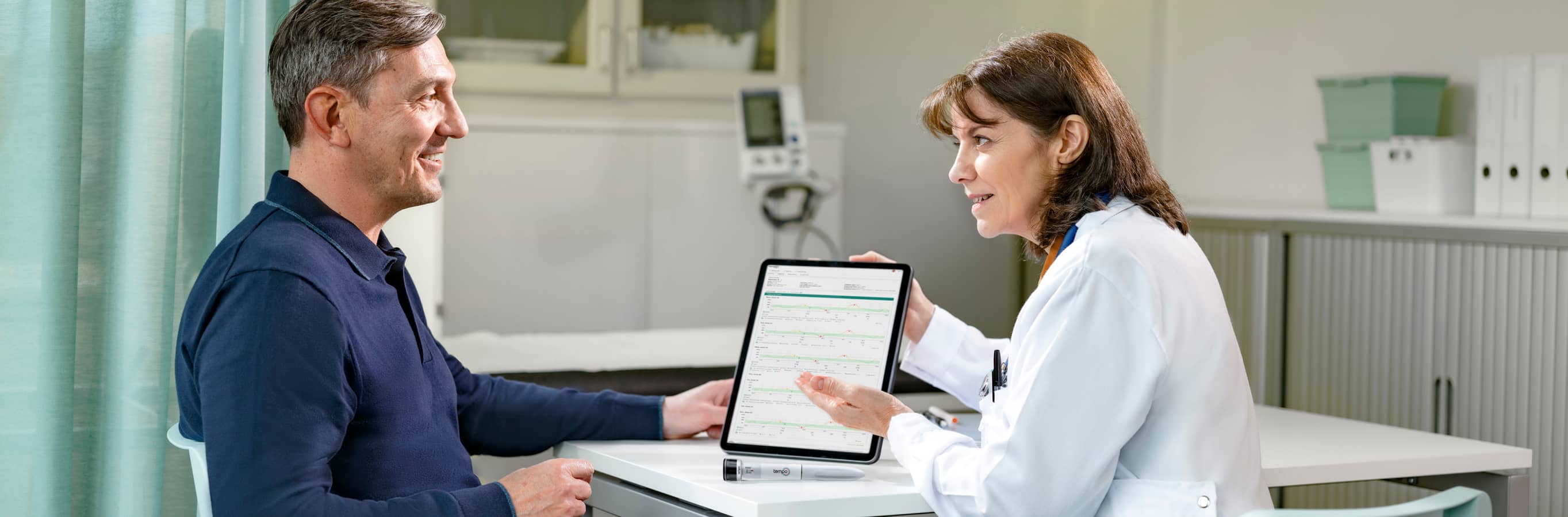 Patient talking to his doctor.