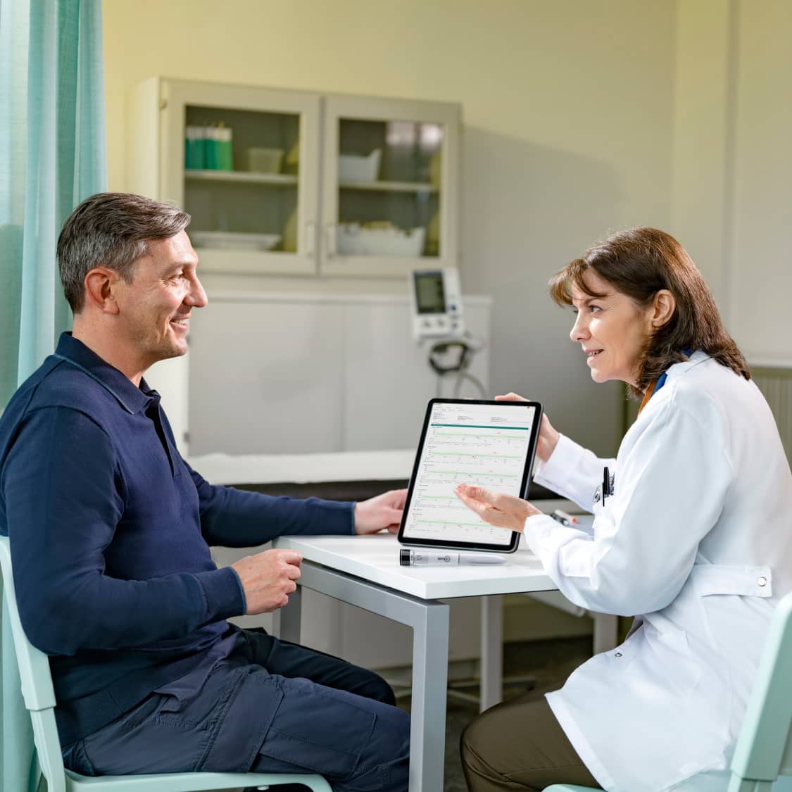 Patient talking to his doctor.