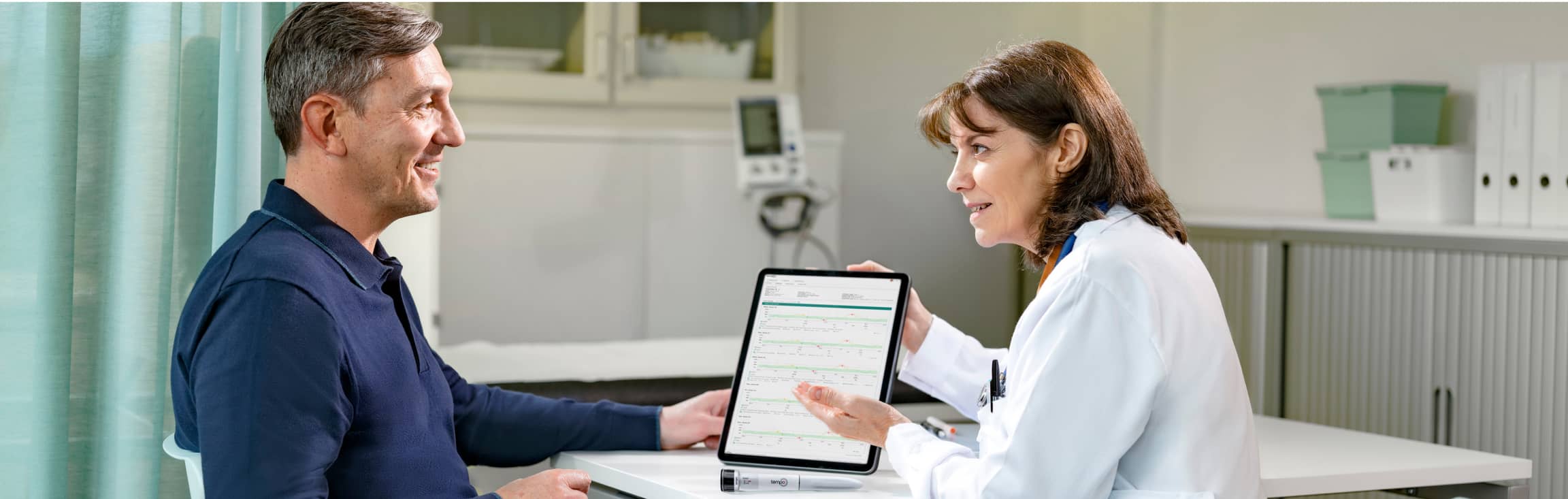 Patient talking to his doctor.